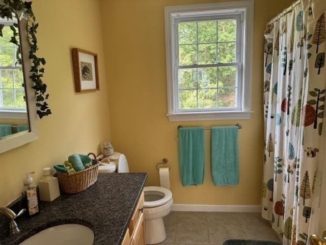 5 Gannett Way, Hopedale, MA 01747 - full bath featuring vanity, healthy amount of natural light, and tile patterned floors