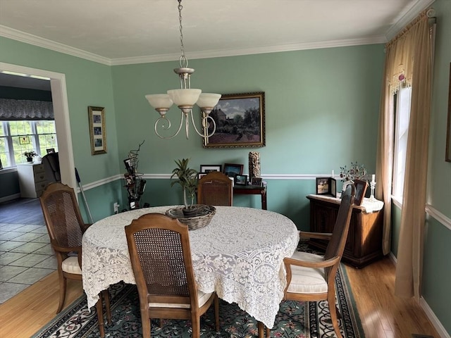 5 Gannett Way, Hopedale, MA 01747 - dining area featuring a chandelier, wood finished floors, and ornamental molding