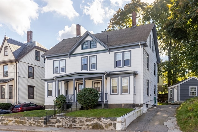 view of front of property featuring covered porch