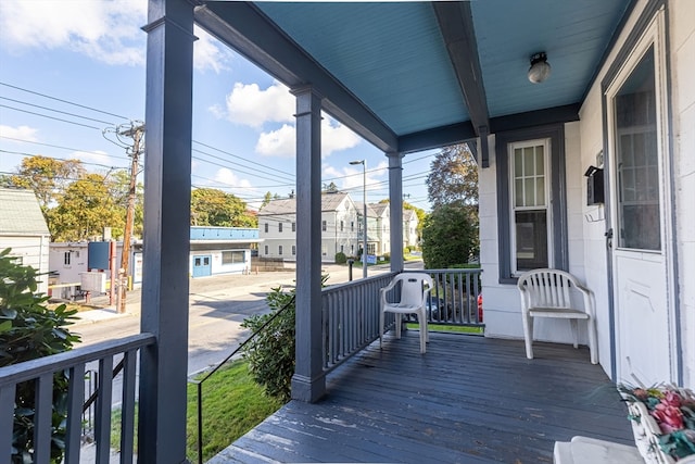 wooden terrace with covered porch