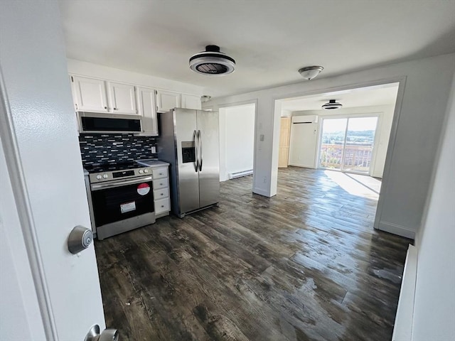 kitchen with a baseboard radiator, stainless steel appliances, dark wood-type flooring, white cabinets, and decorative backsplash