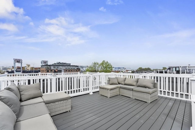 wooden deck featuring an outdoor living space