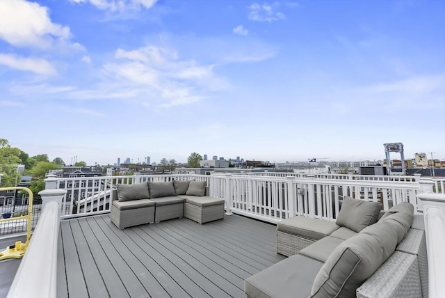 wooden deck with an outdoor hangout area