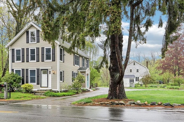 view of home's exterior featuring a lawn