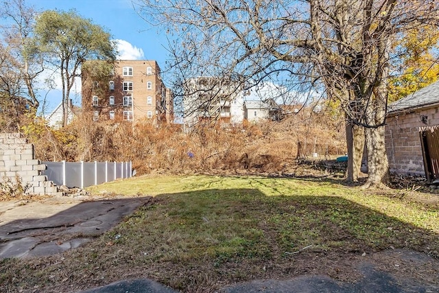 view of yard with fence