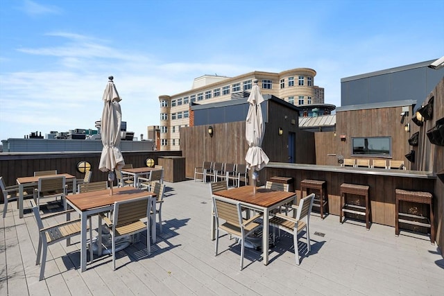 deck with outdoor dining space