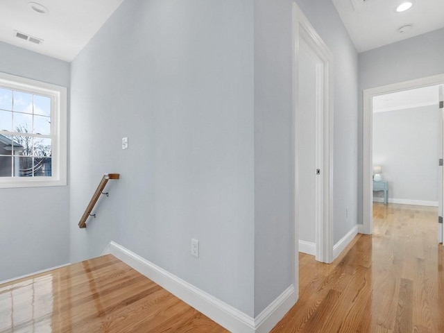 hall with light hardwood / wood-style flooring