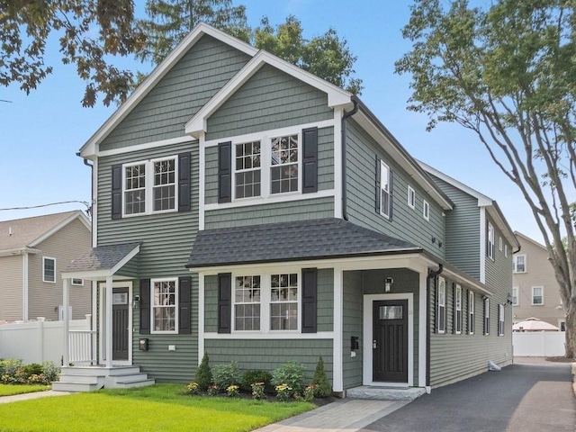 view of front of home with a front lawn