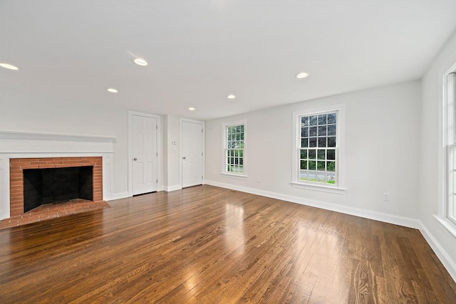 24 Summer St Unit A, Kingston, MA 02364 - unfurnished living room featuring hardwood / wood-style floors, recessed lighting, and a brick fireplace