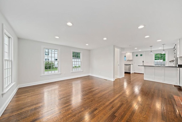 24 Summer St Unit A, Kingston, MA 02364 - unfurnished living room featuring dark wood-style floors and recessed lighting