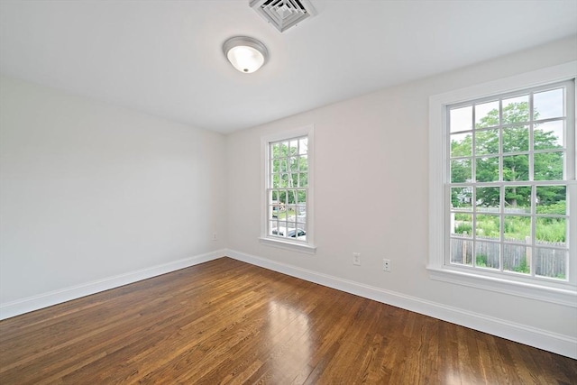 24 Summer St Unit A, Kingston, MA 02364 - unfurnished room with baseboards and dark wood-style flooring