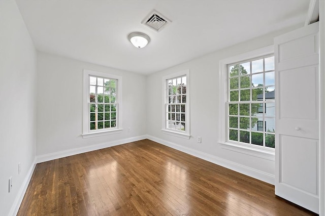 24 Summer St Unit A, Kingston, MA 02364 - unfurnished room featuring baseboards and dark wood-style flooring