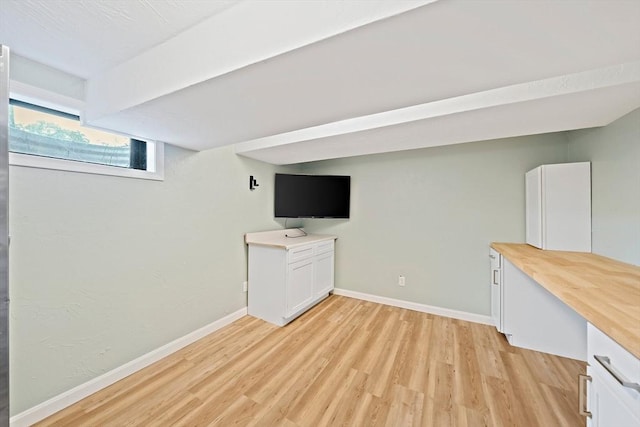 24 Summer St Unit A, Kingston, MA 02364 - basement featuring light wood-style floors and baseboards
