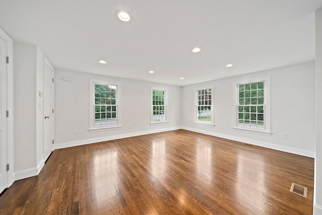 24 Summer St Unit A, Kingston, MA 02364 - empty room with wood finished floors and recessed lighting
