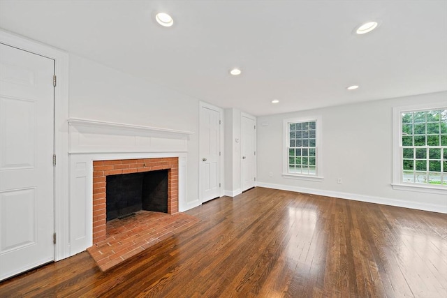 24 Summer St Unit A, Kingston, MA 02364 - unfurnished living room featuring wood finished floors, recessed lighting, and a brick fireplace