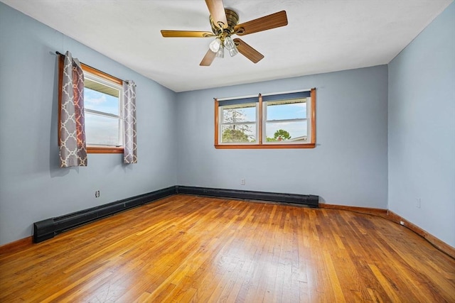20 Roy St, Fairhaven, MA 02719 - spare room with healthy amount of natural light, hardwood / wood-style floors, baseboards, and a ceiling fan