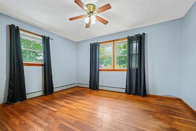 20 Roy St, Fairhaven, MA 02719 - empty room featuring wood finished floors, healthy amount of natural light, and a ceiling fan