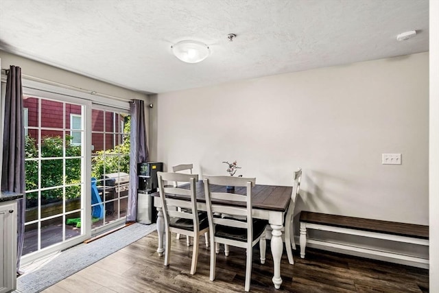 97 Hildreth St Unit 3, Lowell, MA 01850 - dining room with wood finished floors and a textured ceiling