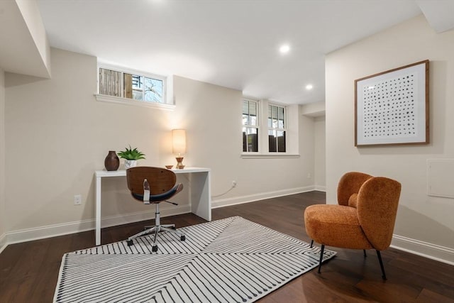 home office with dark wood finished floors, a wealth of natural light, and baseboards