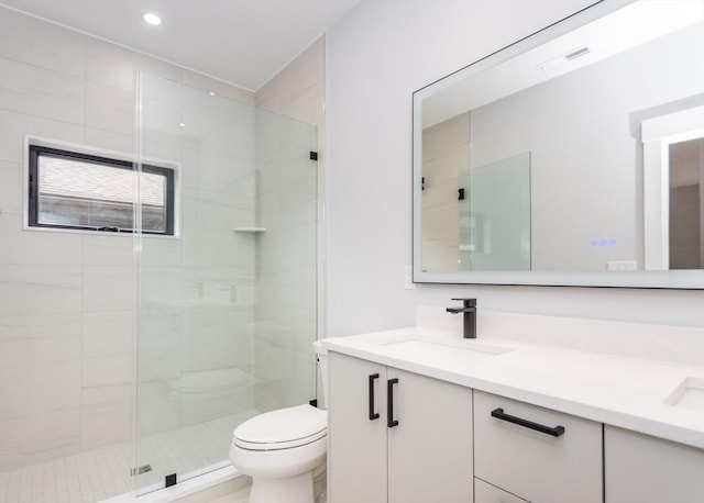 bathroom with visible vents, a stall shower, vanity, toilet, and recessed lighting