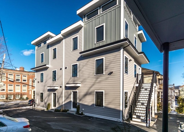 exterior space featuring stairs and entry steps