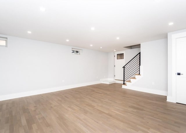 interior space with recessed lighting, baseboards, and light wood finished floors