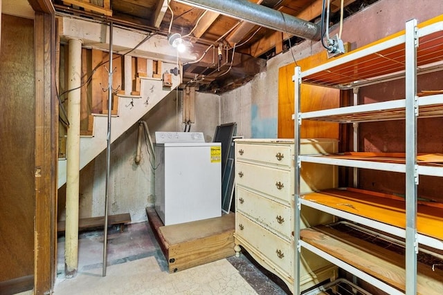 unfinished below grade area with washer / dryer and stairs