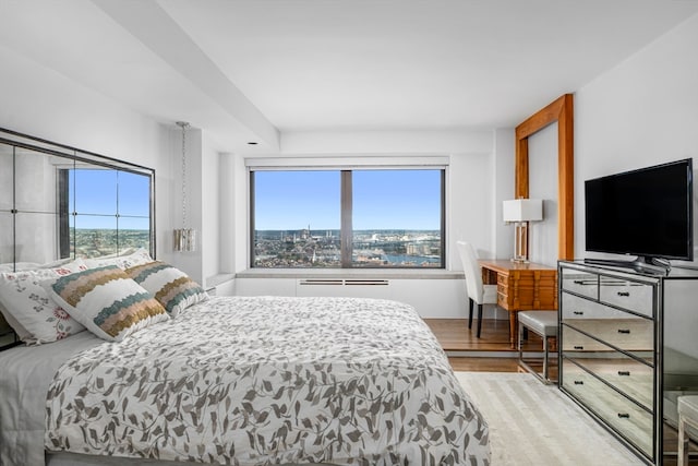 bedroom featuring light hardwood / wood-style floors