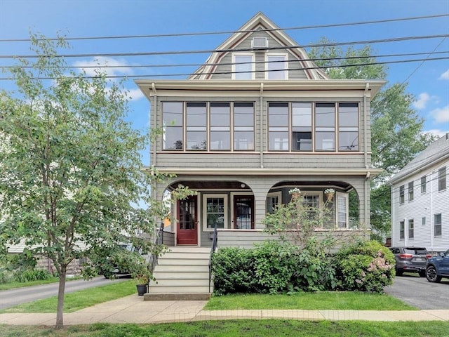 100 Melrose St Unit 100, Arlington, MA 02474 - view of front of home featuring a porch