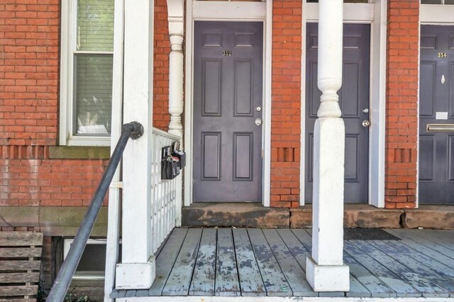 doorway to property with covered porch