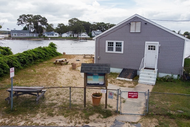 exterior space with a water view