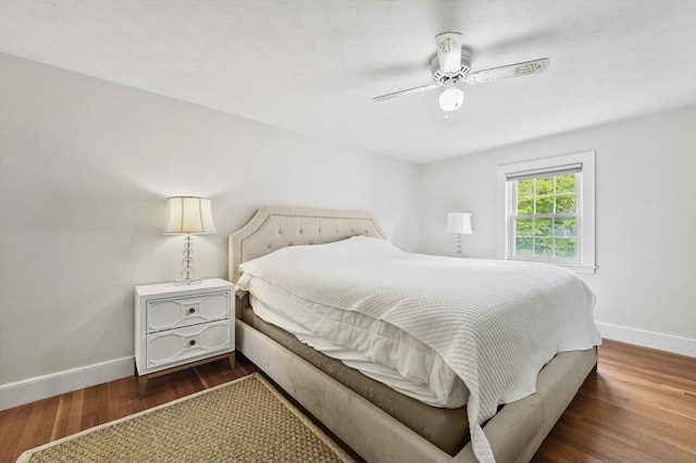 223 Warren St, Waltham, MA 02453 - bedroom featuring baseboards, dark wood-style floors, and a ceiling fan