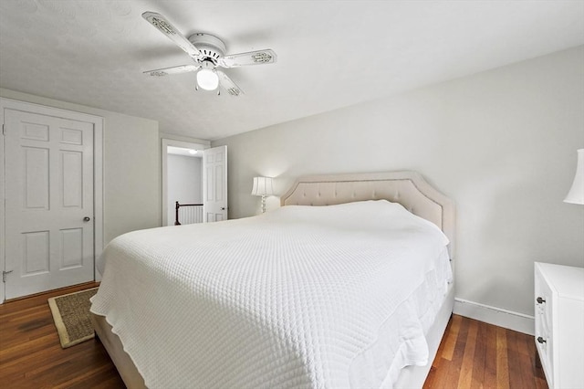 223 Warren St, Waltham, MA 02453 - bedroom with wood finished floors, baseboards, and ceiling fan