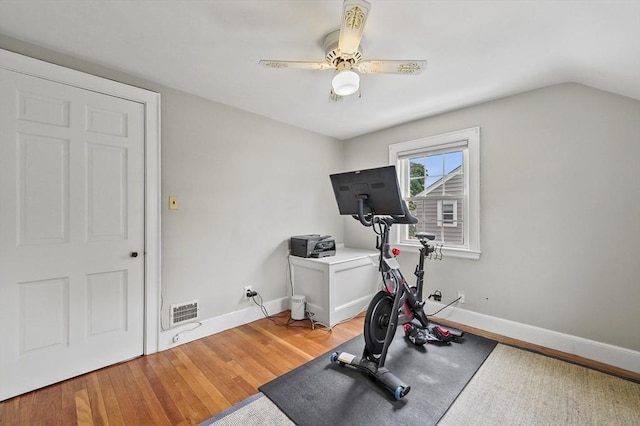 223 Warren St, Waltham, MA 02453 - workout area featuring light wood-type flooring, a ceiling fan, baseboards, and lofted ceiling