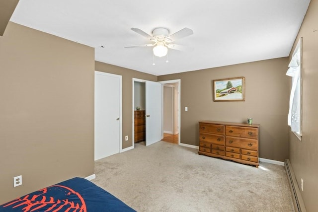 carpeted bedroom featuring baseboards, baseboard heating, and ceiling fan