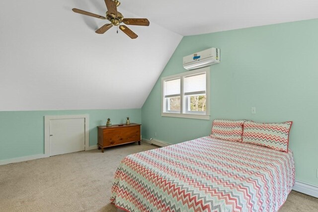 bedroom with vaulted ceiling, carpet flooring, a wall unit AC, and baseboard heating