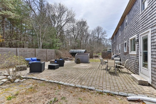 view of patio with a fenced backyard and an outdoor living space