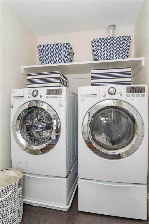 washroom featuring washer and dryer