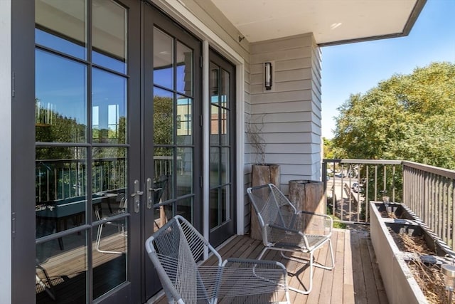 balcony featuring french doors