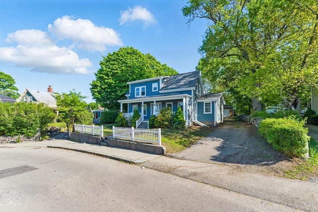 357 Granite St, Quincy, MA 02169 - view of front of property with covered porch and a fenced front yard