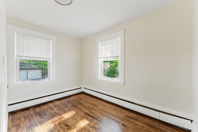 357 Granite St, Quincy, MA 02169 - empty room with a baseboard heating unit and hardwood / wood-style flooring