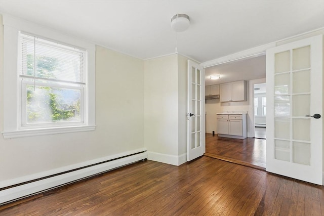 357 Granite St, Quincy, MA 02169 - spare room with a baseboard radiator, french doors, and dark wood finished floors