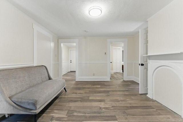 357 Granite St, Quincy, MA 02169 - living area with wood finished floors and a textured ceiling