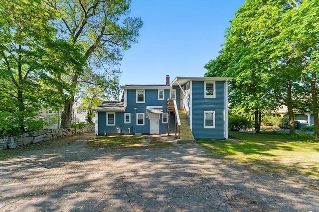 357 Granite St, Quincy, MA 02169 - view of front of house featuring a chimney