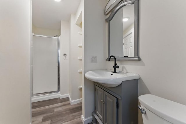 357 Granite St, Quincy, MA 02169 - full bathroom featuring a shower stall, vanity, and wood finished floors