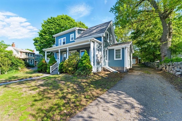 357 Granite St, Quincy, MA 02169 - view of front of property featuring a porch and asphalt driveway