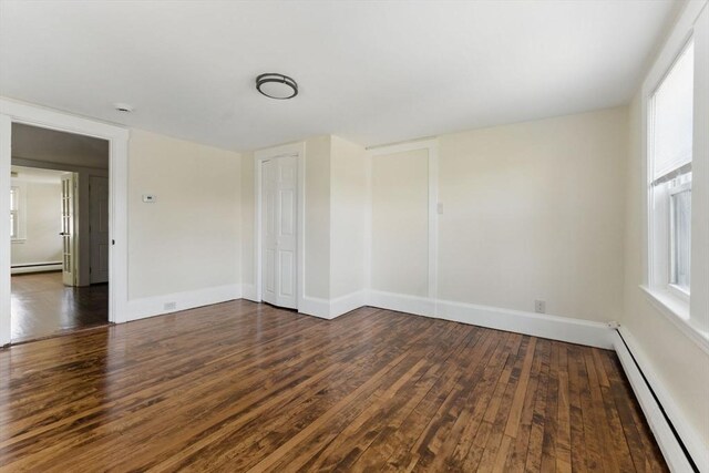 357 Granite St, Quincy, MA 02169 - spare room with a baseboard heating unit, wood finished floors, and a smoke detector