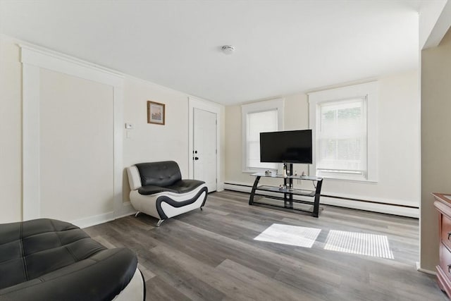 357 Granite St, Quincy, MA 02169 - sitting room featuring a baseboard radiator and wood finished floors