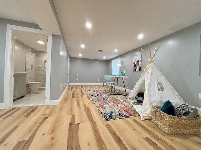 game room with recessed lighting, visible vents, baseboards, and wood finished floors