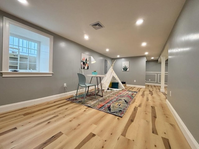 playroom featuring recessed lighting, visible vents, baseboards, and wood finished floors